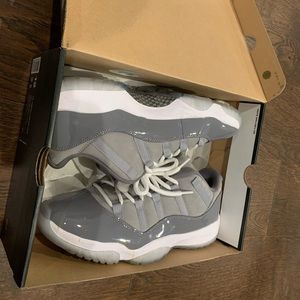 Nike air Jordan 11s low tops in grey sz 12